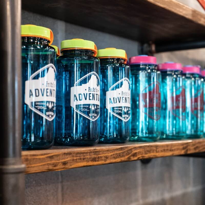 Souvenir water bottles and coffee mugs